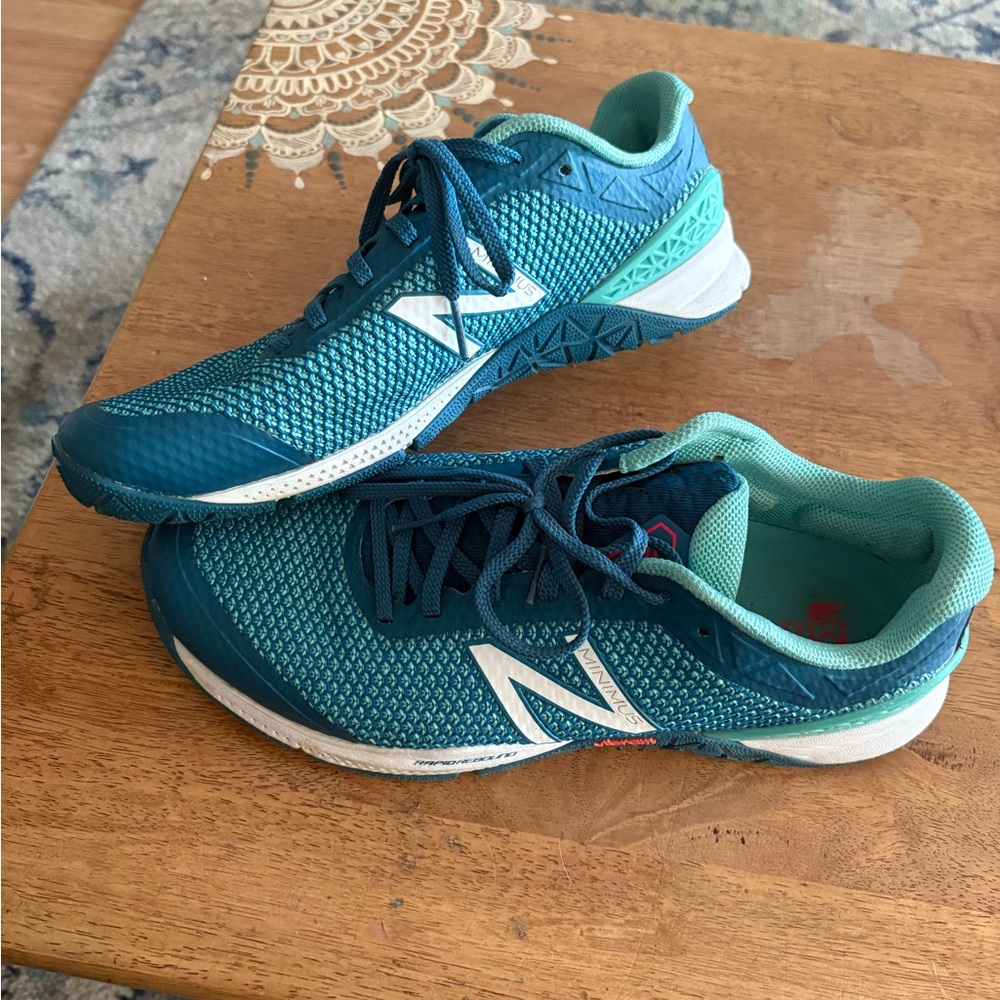 New Balance size 10 barely worn  Aqua and Navy Sneakers